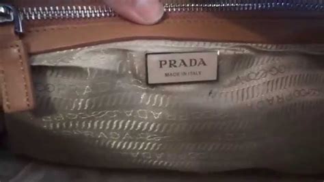 how can you tell if a prada purse is real|prada bag serial number.